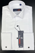 Folded boys white tuxedo shirt with black stud buttons