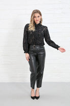 Rant & Rave Daisy Blouse Black worn by model, angled view, relaxed fit sheer floral lace long sleeve design