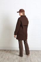 Rant & Rave Georgia Coat in chocolate brown worn by model, back view showing storm flap and raglan sleeves