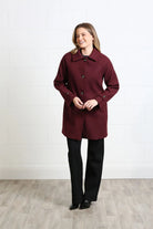 Rant & Rave Georgia Coat in deep port worn by model, front view with collar and button fastening