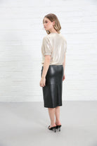 Rant & Rave Jenny Top in gold worn by model, back view showing relaxed fit