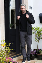 Kenrow Jett Chino Grey worn by model standing at doorway, front view
