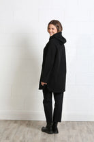Rant & Rave Joanna Coat in black, back model view with hood