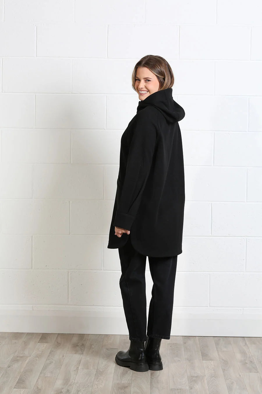 Rant & Rave Joanna Coat in black, back model view with hood