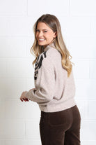 Rant & Rave Sarah Jumper in light brown, side model view showing the black sequin rose motif