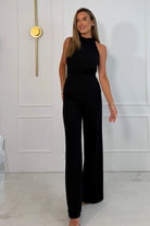 Girl In Mind Fifi halter tie jumpsuit in black, front model view