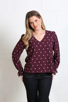 Rant & Rave Sophia top in burgundy dot, front model view