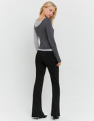 Tally Weijl Black Flare Trousers worn by model, back view