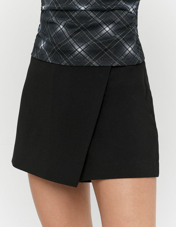Tally Weijl Black Mini Skort worn by model, closer view