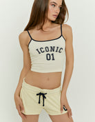 Tally Weijl yellow printed tank top worn by model, front view with Iconic 01 graphic
