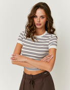 Tally Weijl white and brown striped T shirt worn by model, close front view