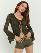 Tally Weijl khaki lace top in green, front model view with tie - front detail and flared cuffs