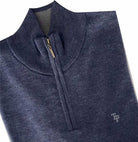 Close-up of the Tom Penn Indigo 1/4 Zip Knit collar, quarter zip and chest logo