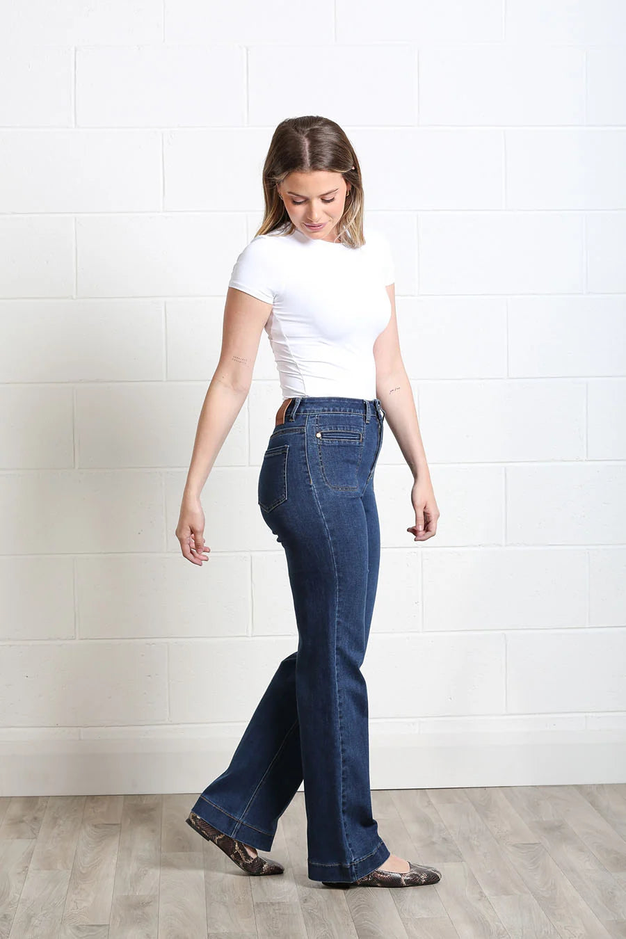 Rant & Rave Ada wide leg jean in Mid Ink, angled back model view.