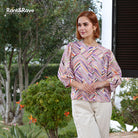 Rant & Rave Alexis blouse in purple with abstract striped print, front model view