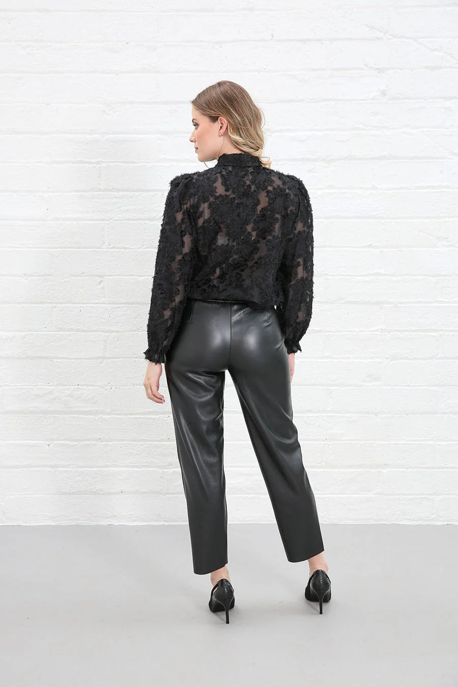 Rant & Rave Daisy Blouse Black worn by model, back view, sheer floral lace back, high collar