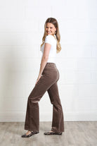 Rant & Rave Emily Wide Leg Cord Taupe trousers worn by a model, side model view