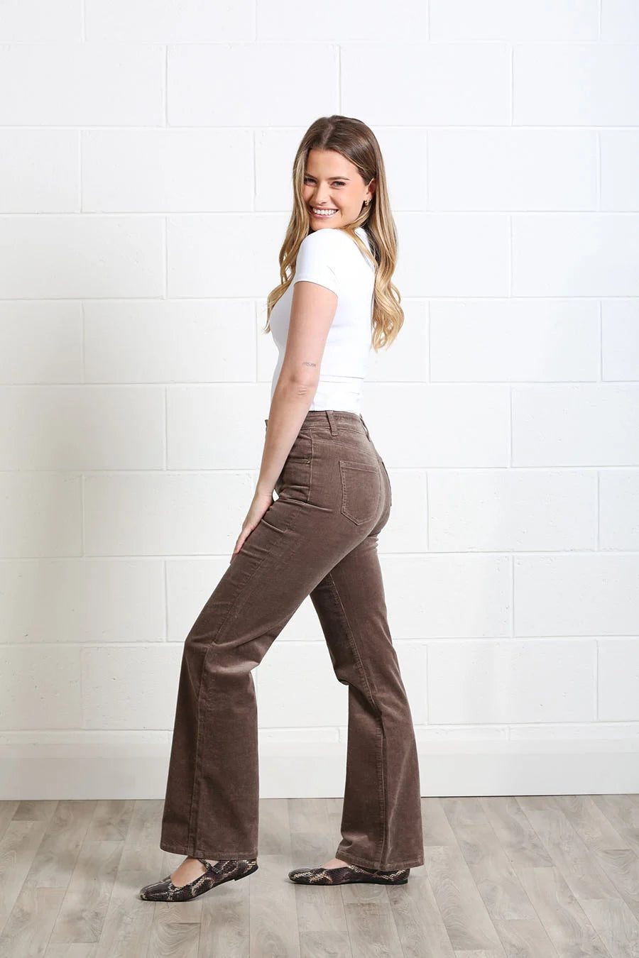 Rant & Rave Emily Wide Leg Cord Taupe trousers worn by a model, side model view