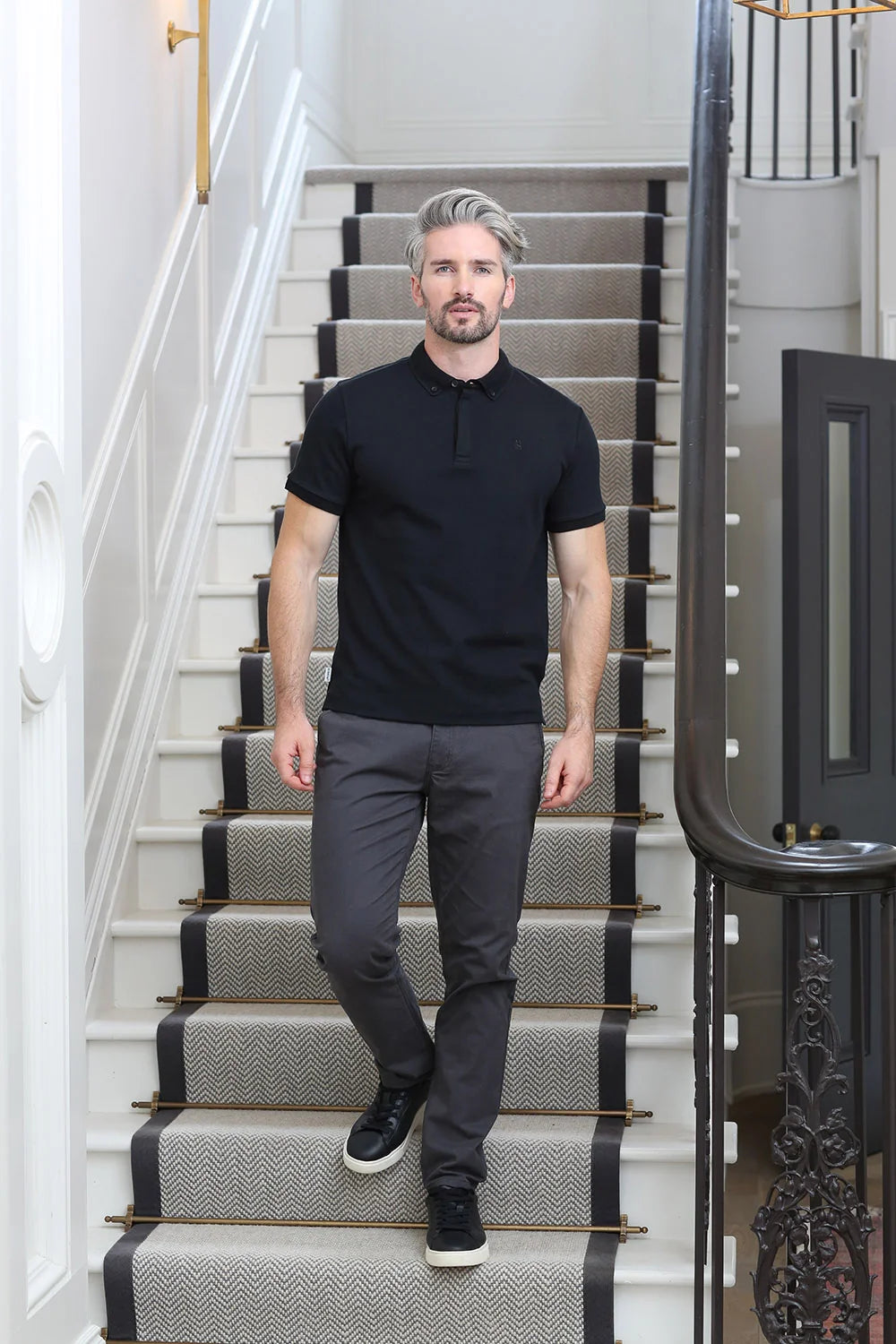 Kenrow Jett Chino Grey worn by model walking down stairs, front view