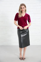 Rant & Rave Matilda Velvet Top Pink, front view worn by model with hands at hem, V-neck button detail visible