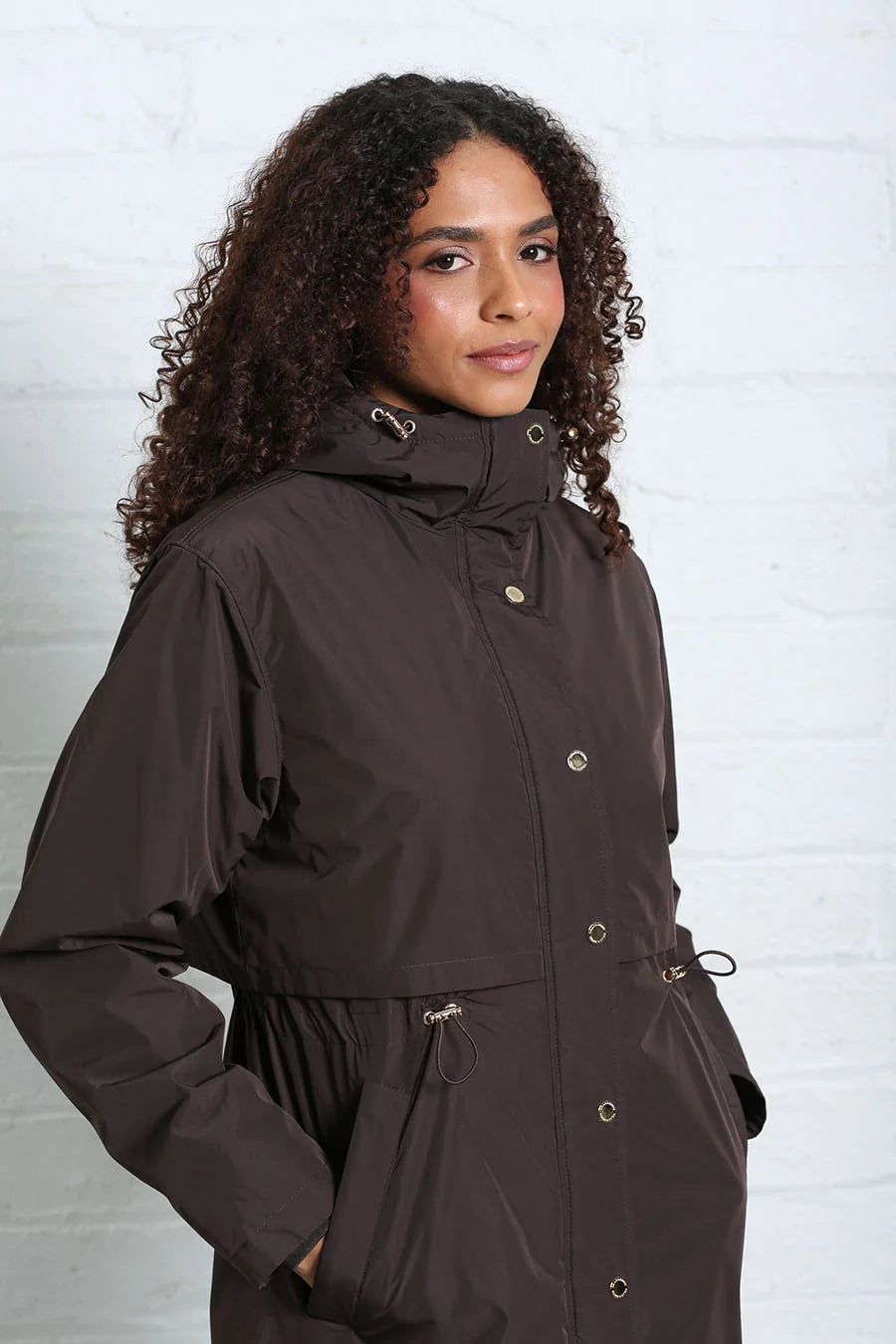Rant & Rave Relax & Renew Becca jacket in chocolate brown, angled model view showing hood and drawstring waist