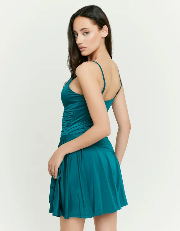 Tally Weijl green mini dress worn by model, back angled view with thin straps