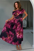 Girl In Mind Betty plum floral skater midi dress with asymmetric neckline, angled model view