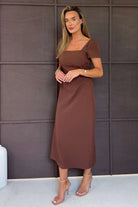 Girl In Mind Valentina brown midi dress, angled model view.