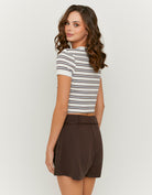 Tally Weijl white and brown striped T shirt worn by model, back view