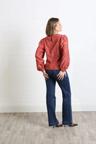 Rant & Rave Zeta Top in terracotta, angled back model view showing the textured finish and back neckline detail.