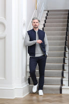 Kenrow Andy Gilet Navy angled model view styled with grey jumper and navy trousers