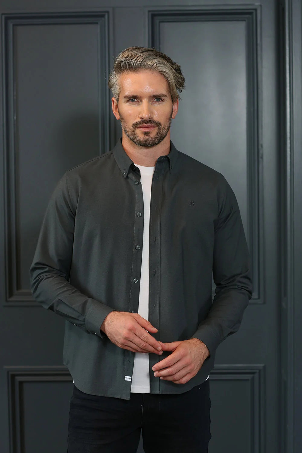 Kenrow Fritz Shirt Pewter Green worn by model with hands clasped and white t-shirt underneath