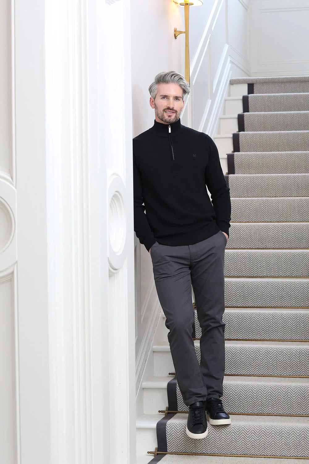 Kenrow Jett Chino Grey worn by model leaning against wall, side model view