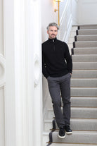 Kenrow Jett Chino Grey worn by model leaning against wall, side model view