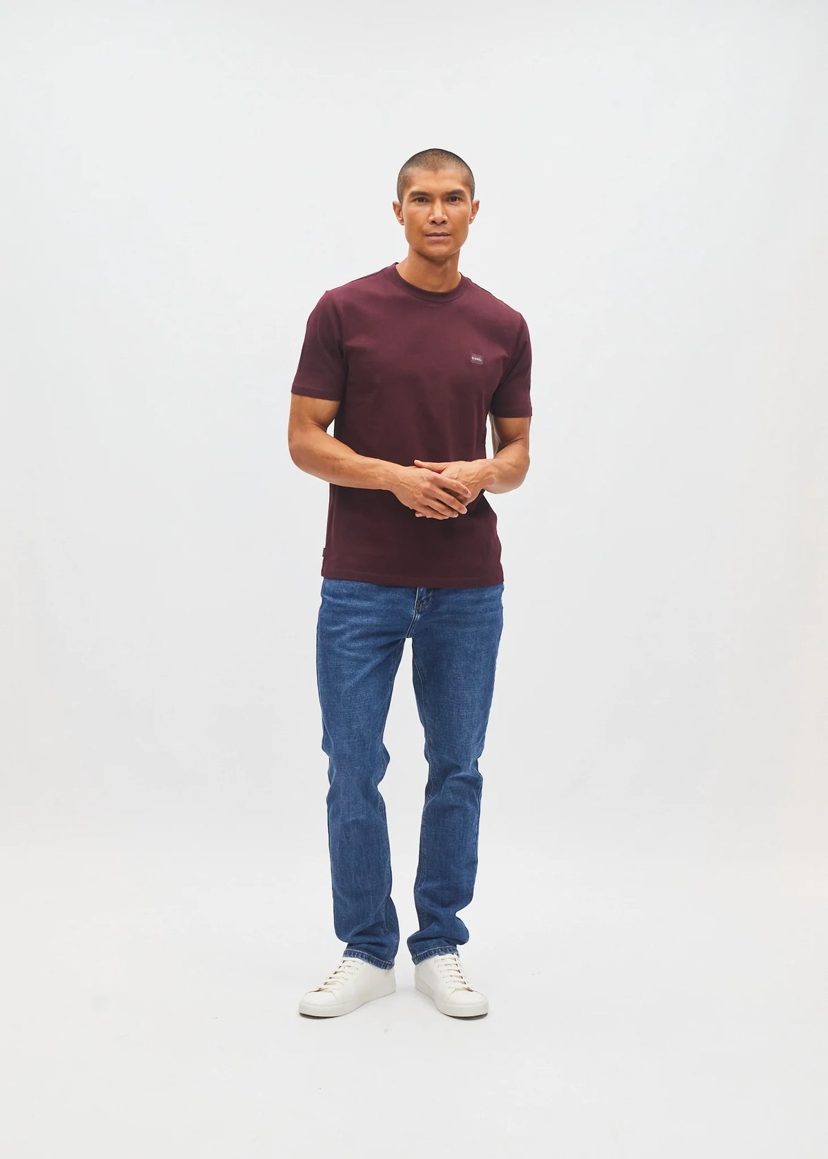 Diesel John Tee in deep burgundy worn by a model, front view