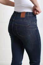 Rant & Rave Margaret bootcut jeans in mid blue, back pocket and waistband detail