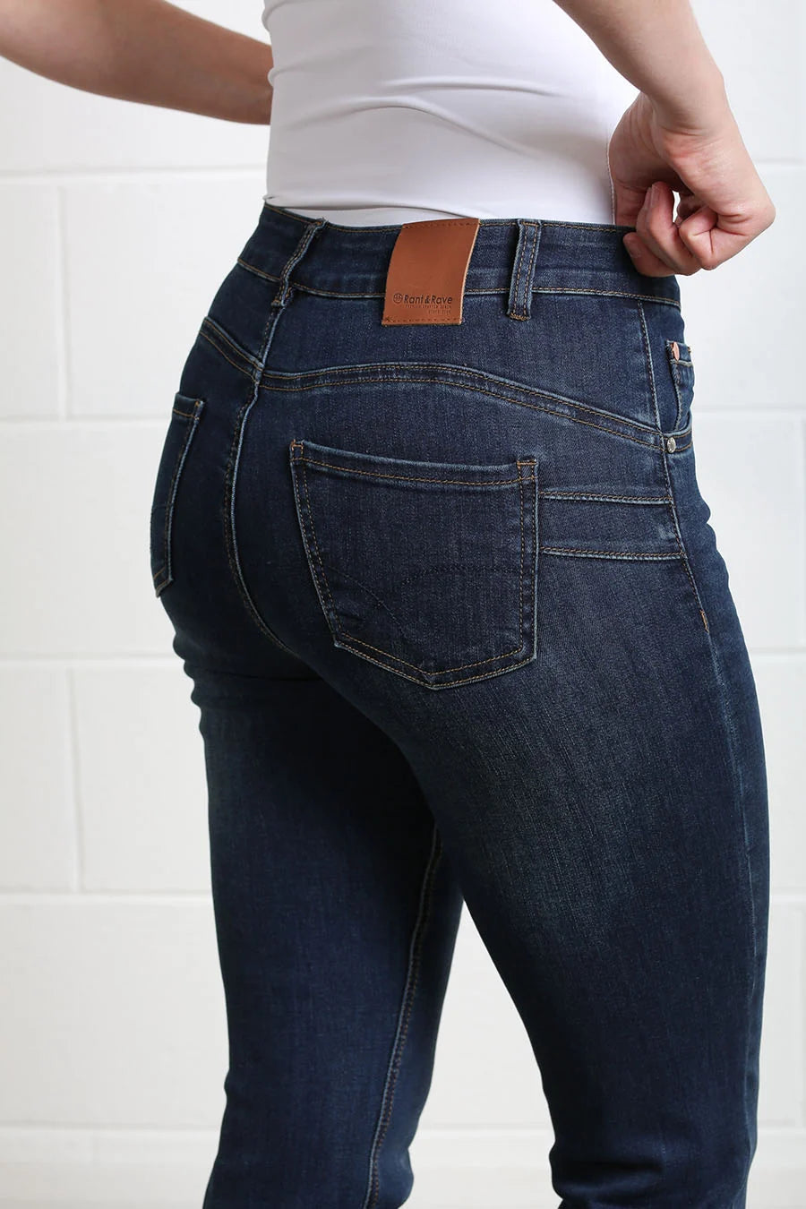 Rant & Rave Margaret bootcut jeans in mid blue, back pocket and waistband detail