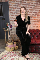 Rant & Rave Matilda Velvet Top Black worn by model, seated angled view