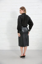 Rant & Rave Natalia Top Black worn by model, back view showing gathered yoke and button cuffs