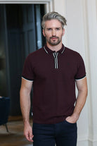 Kenrow Otto Polo maroon worn by a model, angled view