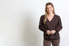 Rant & Rave Sophia Top Chocolate Dot, front view worn by smiling model with V-neck and spot pattern.