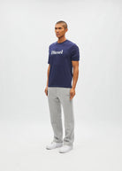 Diesel Walter Tee in navy worn by a model, angled front view with the white Diesel chest logo visible.