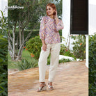 Rant & Rave Alexis blouse in purple with abstract striped print, full - length model view