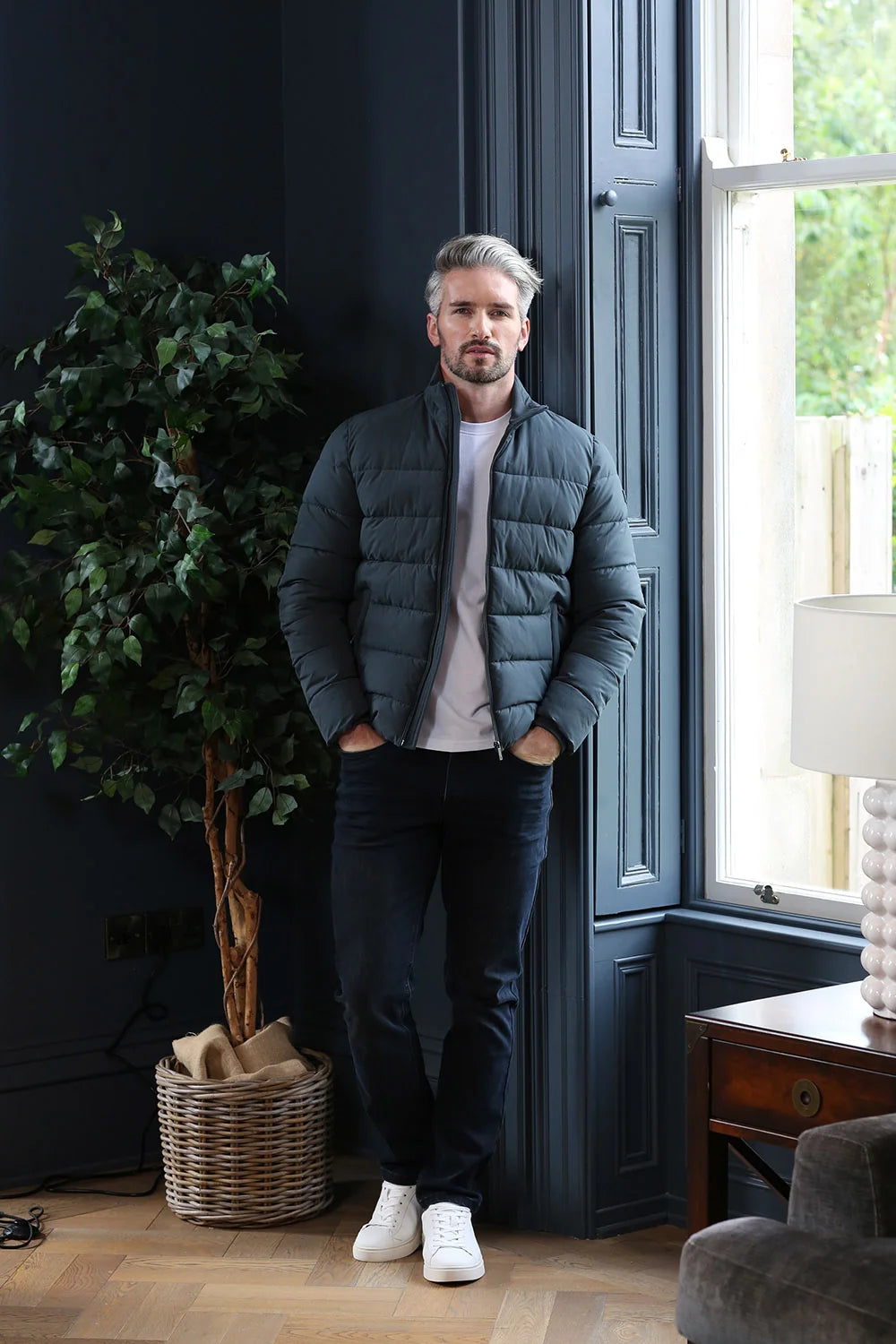 Kenrow Beck Jacket Pewter worn by model, full length view with hands in pockets and white trainers
