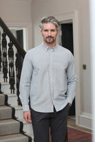 Kenrow Fritz Shirt in light grey worn by model, front view with hand in pocket.