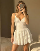 Tally Weijl white lace ruffle mini dress worn by model in mirror selfie, front view