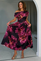 Girl In Mind Betty plum floral skater midi dress, angled model view with full skirt