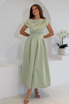 Girl In Mind Betty asymmetric neckline skater midi dress in sage, full - length front model view