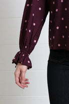 Rant & Rave Sophia top in burgundy dot, sleeve cuff detail