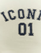 Detail view of the Iconic 01 print on the Tally Weijl yellow tank top